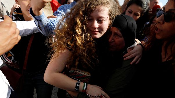 Israel releases Palestinian teenager who struck soldier Israel releases Palestinian teenager who struck soldier