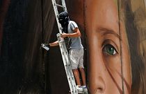 Israel releases Italian street artist arrested over mural of Ahed Tamimi
