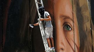 Israel releases Italian street artist arrested over mural of Ahed Tamimi 