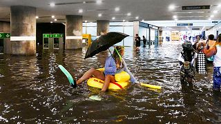 Cooling off? Swedes turn flooded station into swimming pool