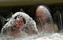 In pictures: Trying to keep cool in Europe’s heatwave
