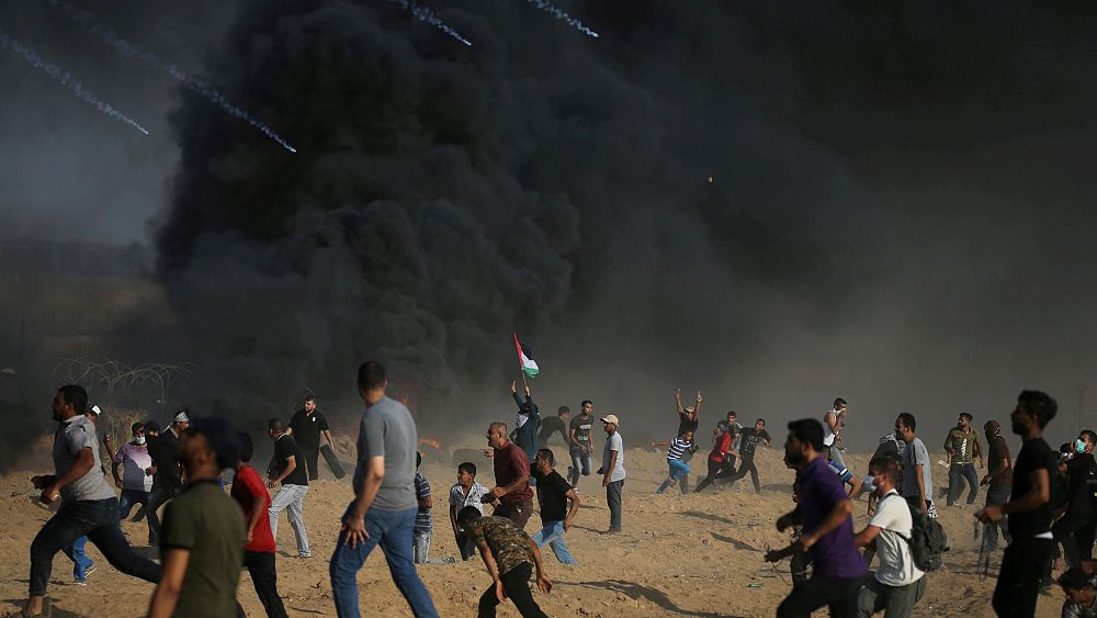 Family remain defiant at funeral of Palestinian teenager