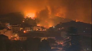 Portuguese and Spanish firefighers struggle to contain wildfires