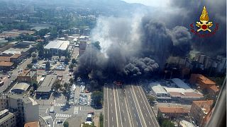 Two dead, dozens injured in Bologna motorway blaze