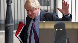 Britain's Foreign Secretary Boris Johnson waves as he leaves Downing Street