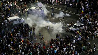 Emigrantes romenos em Bucareste para manifestações contra o Governo 