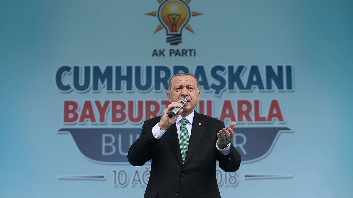 Erdogan blames "plot against Turkey" for plunging lira