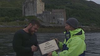 Watch: British swimmer breaks world record for longest staged sea swim