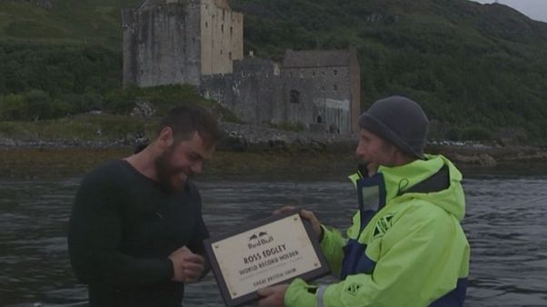 Watch: British swimmer breaks world record for longest staged sea swim Watch: British swimmer breaks world record for longest staged sea swim