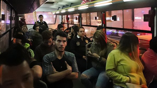 Migranten in einem Bus in Peru Migranten in einem Bus in Peru