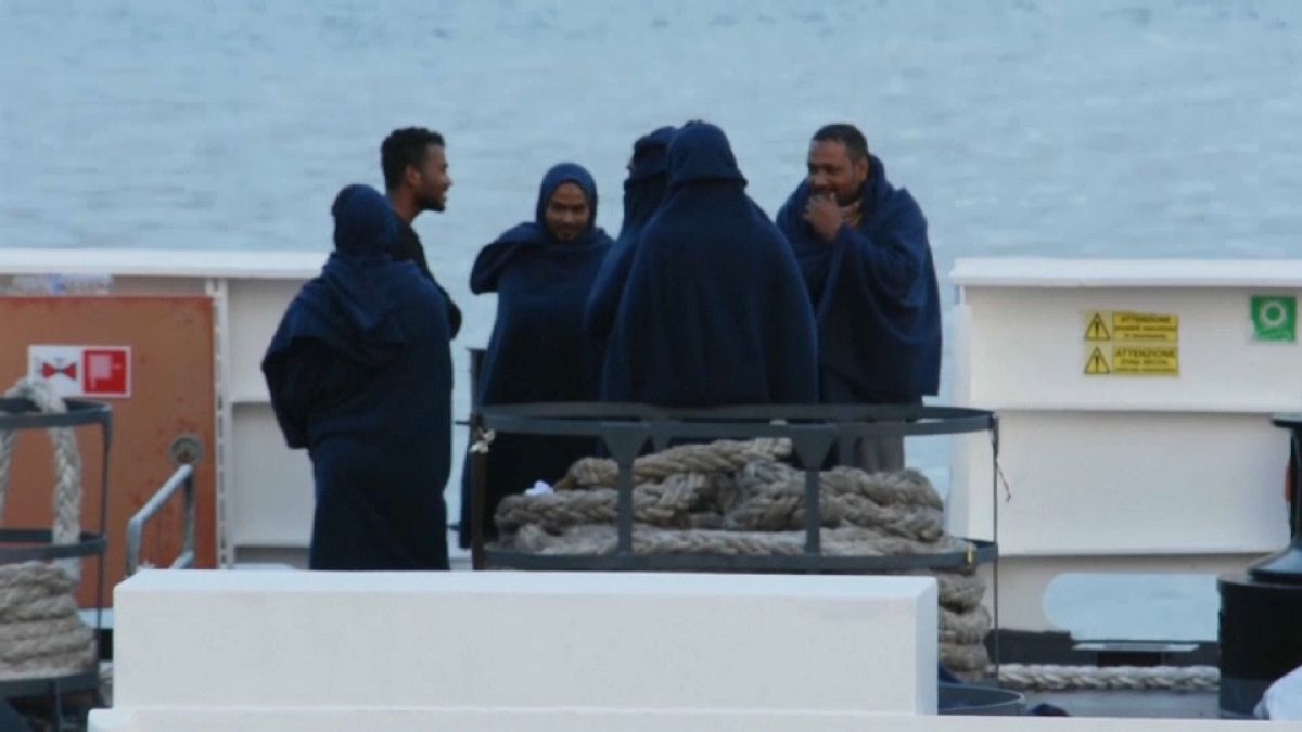 Migrants on board Italian coastguard ship docked in Catania, Sicily