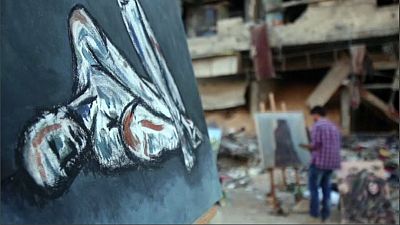 Watch: Syrian artists create colour amid ruins