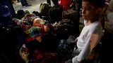 Venezuelan migrants arrive at the Binational Border Service Center of Peru,