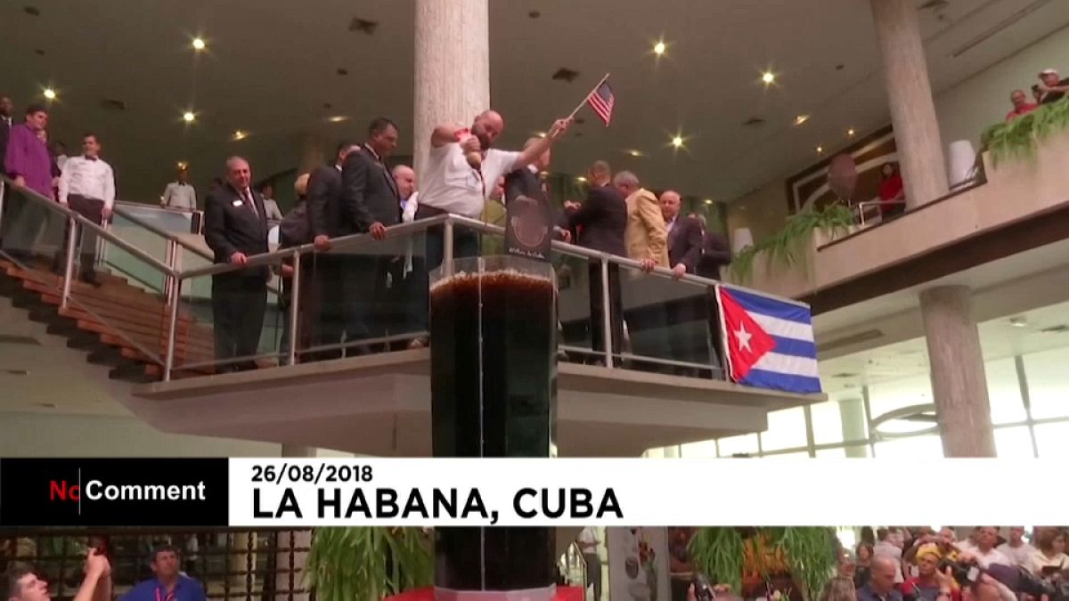Bartenders from the Americas make giant Cuba Libre in Havana