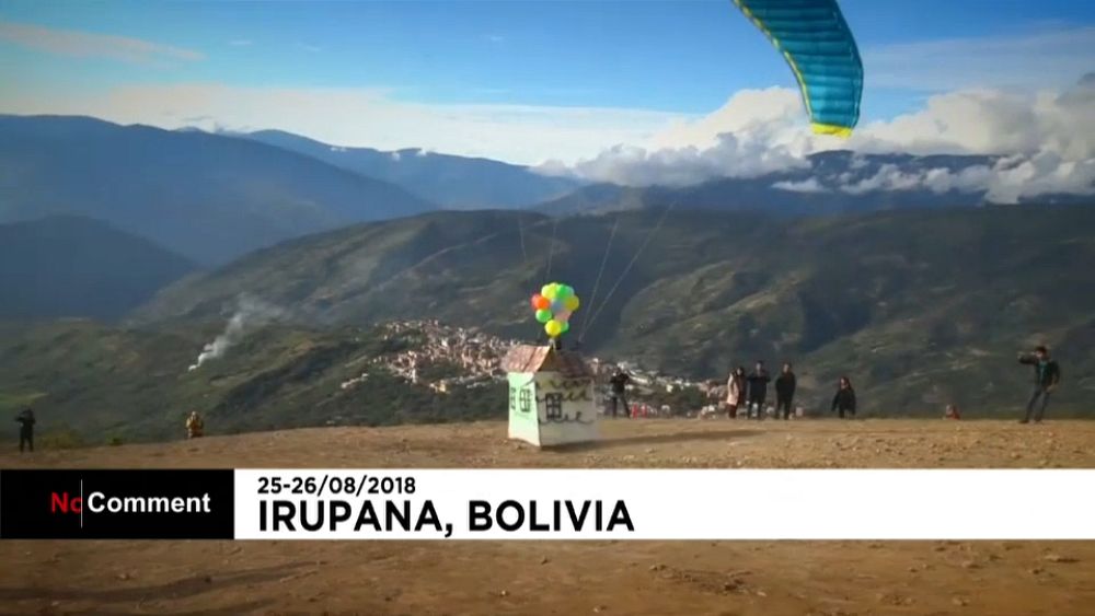 Watch: Fancy-dress paragliders in Bolivia