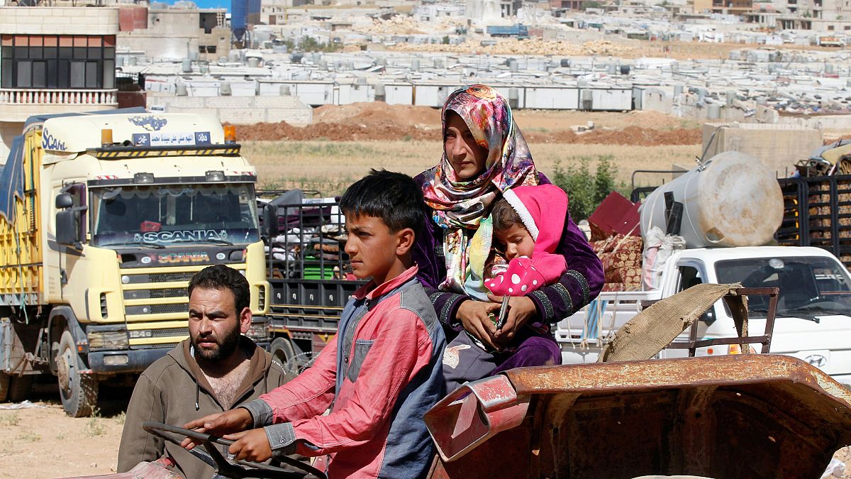 A Syrian family prepares to return to Syria from Lebanese border town