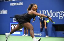 Serena Williams wins US open match in designer tutu following catsuit ban
