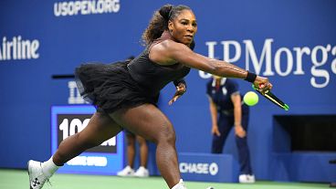 Serena Williams wins US open match in designer tutu following catsuit ban