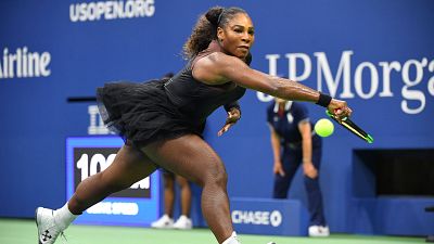 Serena Williams wins US open match in designer tutu following catsuit ban
