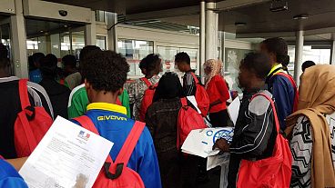 Nearly 60 migrants previously stranded at sea on Aquarius arrive in France