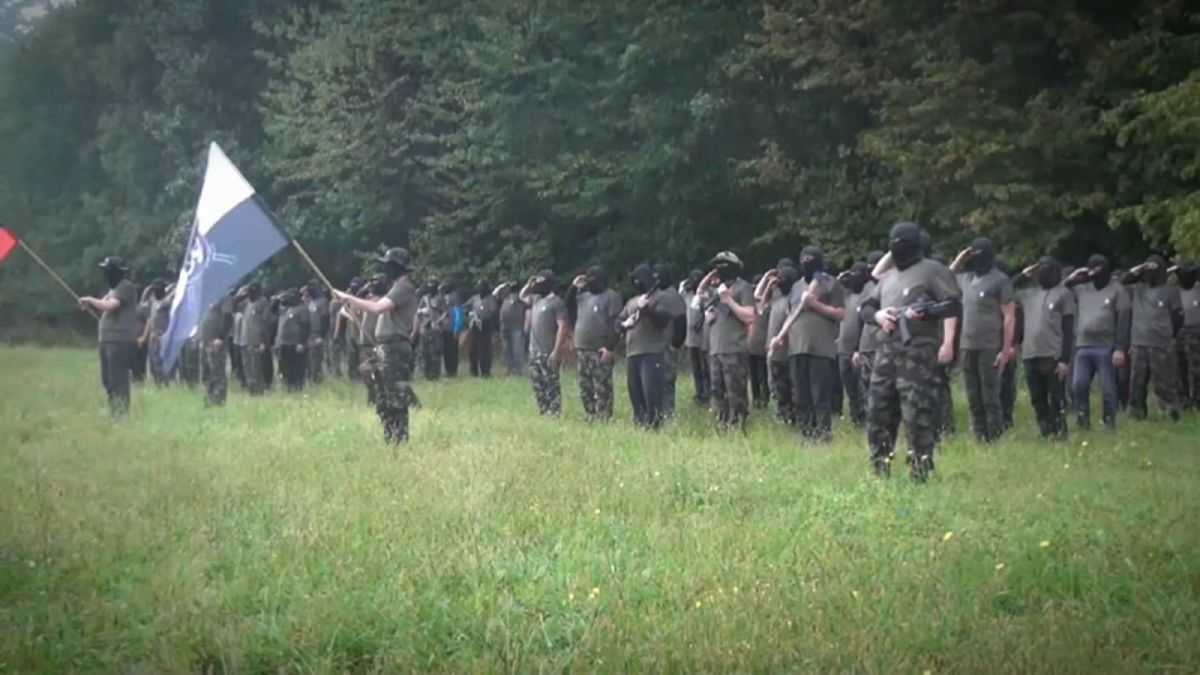 Watch: Masked armed group in Slovenia pledges to ‘secure order if necessary’