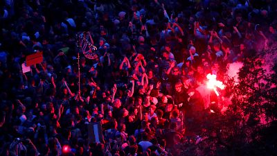 People attend an open air "anti-racism concert" in Chemnitz, Germany