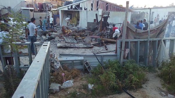 A camp for displaced people is hit by shelling near Tripoli on Sept 2. A camp for displaced people is hit by shelling near Tripoli on Sept 2.
