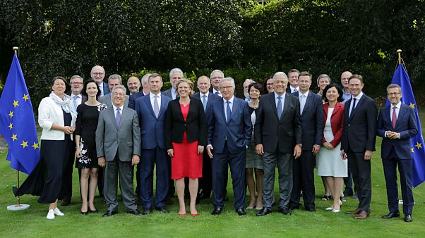 Jean-Claude Juncker poses with members of the EU's executive Jean-Claude Juncker poses with members of the EU's executive