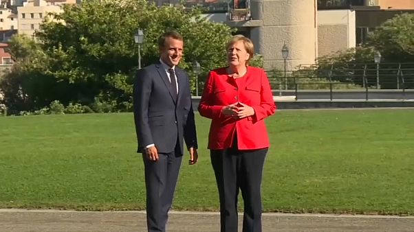Macron y Merkel quieren más unidad frente al populismo Macron y Merkel quieren más unidad frente al populismo