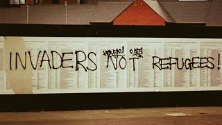 ‘Invaders not refugees’: UK migrant memorial defaced again