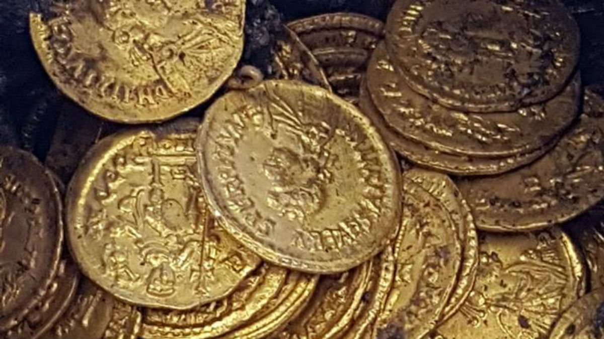 Hundreds of Roman gold coins discovered in Italian theatre  