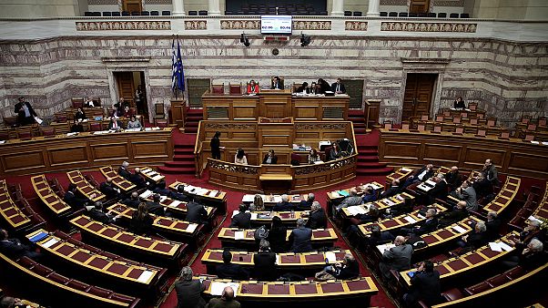 Greek lawmakers attend a parliamentary session before a vote on a one-off benefit approved to pensioners in Athens, Greece, December 15, 2016. REUTERS/Alkis Konstantinidis Greek lawmakers attend a parliamentary session before a vote on a one-off benefit approved to pensioners in Athens, Greece, December 15, 2016. REUTERS/Alkis Konstantinidis