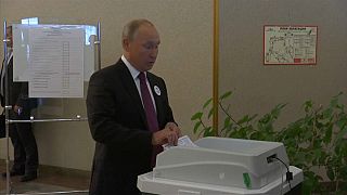 Watch: Putin squirms as voting machine rejects his ballot