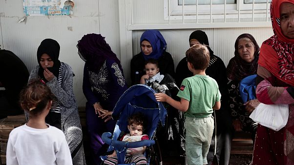 Familias de refugiados em Lesbos, Grécia Familias de refugiados em Lesbos, Grécia