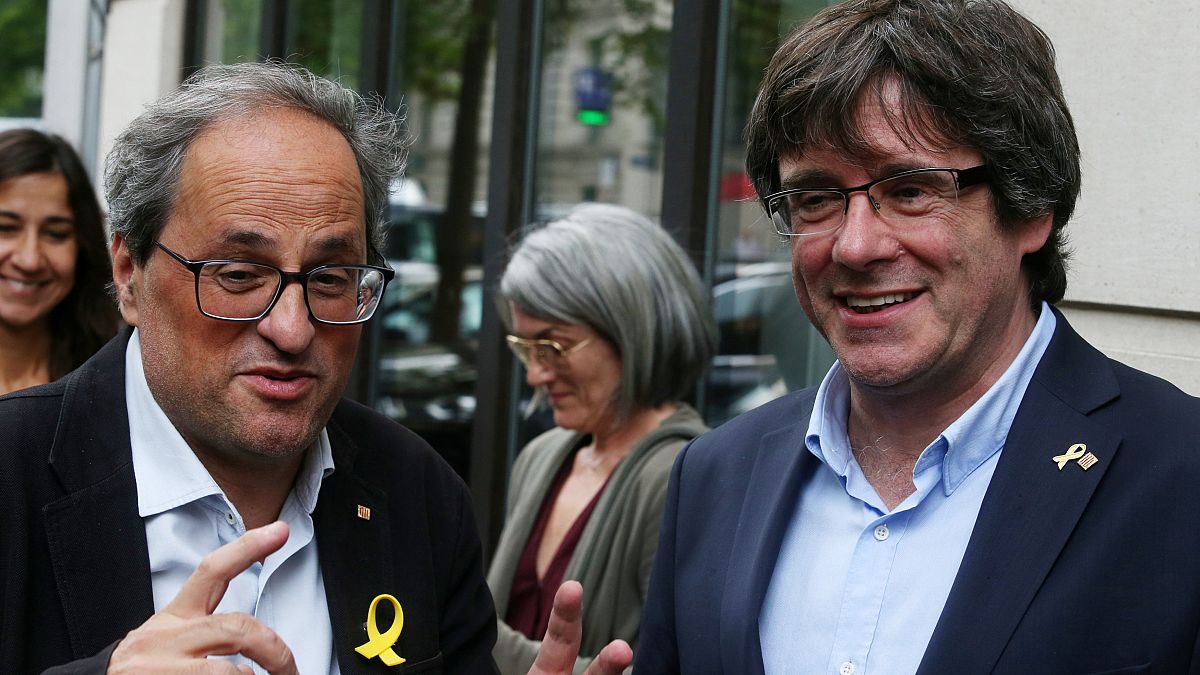 Separatist Catalan leader Quim Torra and his predecessor Carles Puigdemont