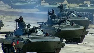 Putin claims no aggressive intent as war games end