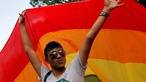 A man takes part in Gay Fest 2014 pride parade in Bucharest, Romania. A man takes part in Gay Fest 2014 pride parade in Bucharest, Romania.