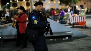 Three killed in Mexico City tourist hotspot, police chase 'mariachi' gunmen