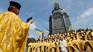 Clergymen from the Ukrainian Orthodox Church of the Kyiv Patriarchate take