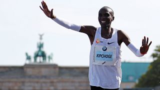 Athletics: Kenyan Eliud Kipchoge breaks marathon world record in Berlin