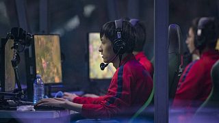 Team LGD plays "Team Evil Geniuses" at an eSports tournament in Vancouver