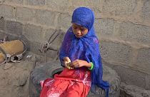 Children eat leaves in a bid to avoid starvation in war-torn Yemen