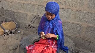 Children eat leaves in a bid to avoid starvation in war-torn Yemen