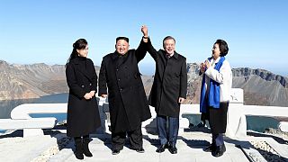 Moon Jae-in and North Korean leader Kim Jong Un