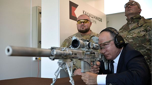 Watch: Putin shows off sniper skills with new Kalashnikov rifle Watch: Putin shows off sniper skills with new Kalashnikov rifle