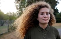 Ahed Tamimi poses for a picture before conference in Nantes France
