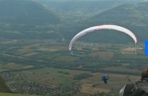 French festival celebrates fancy-dress paragliding