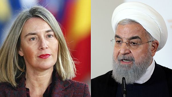 الرئيس الإيراني حسن روحاني وفيديريكا موغيريني الرئيس الإيراني حسن روحاني وفيديريكا موغيريني