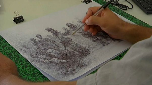 Exiled Syrian artist recreates his suffering in the country's prisons Exiled Syrian artist recreates his suffering in the country's prisons