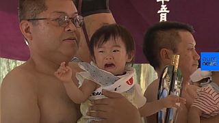 Japan: the sumo lifting event with a prize for making babies cry